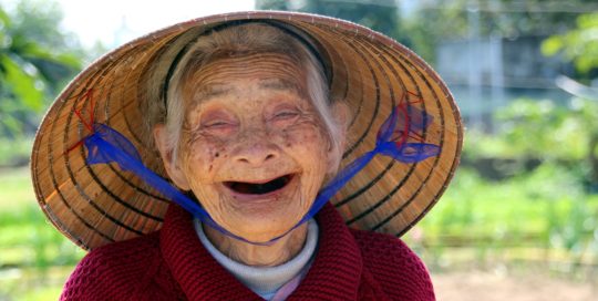 Lachende vietnamesische Dame Bild
